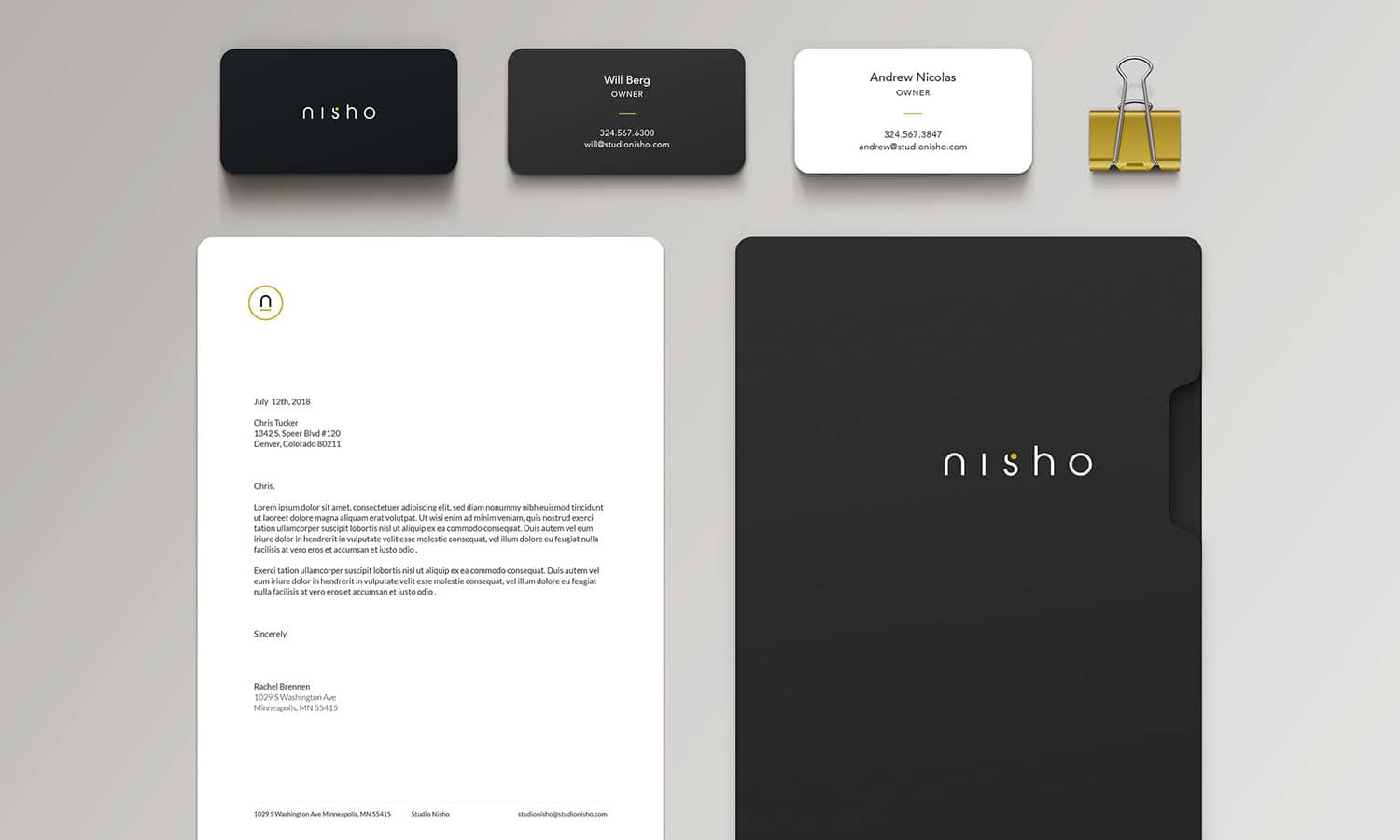 Photo of stationary and business cards designed for new Studio Nisho brand identity.