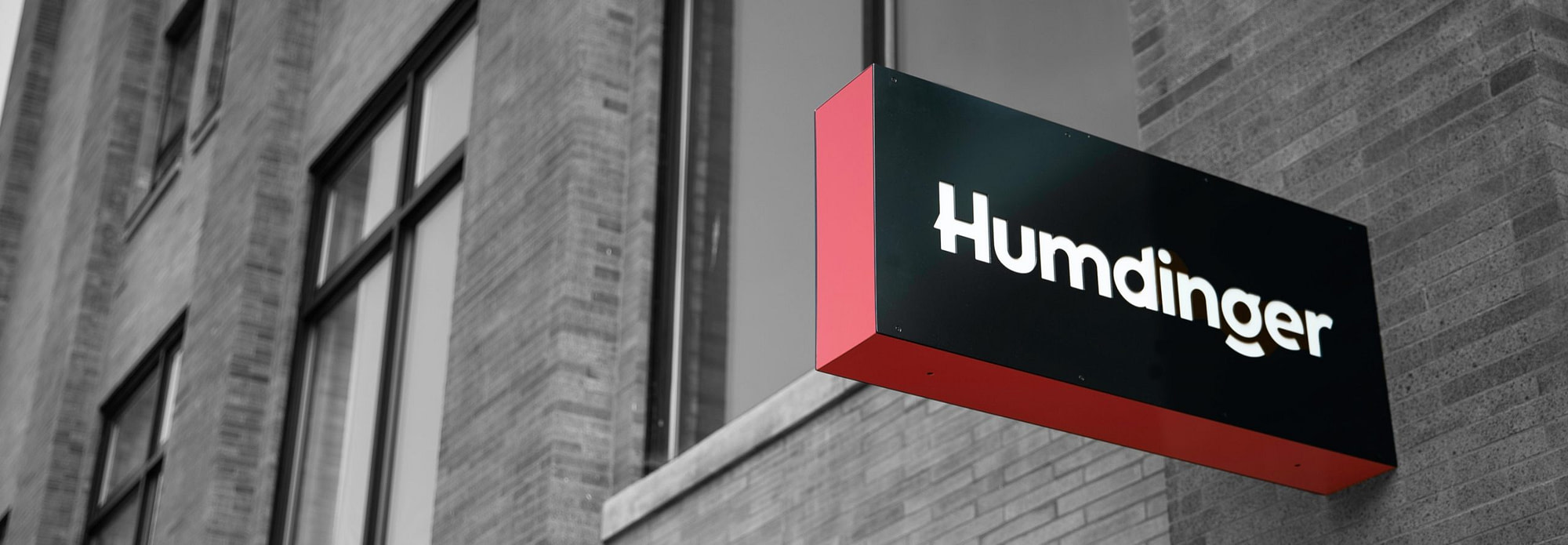 Black-and-white photo of Humdinger sign on Washington Avenue in Minneapolis, Minnesota.